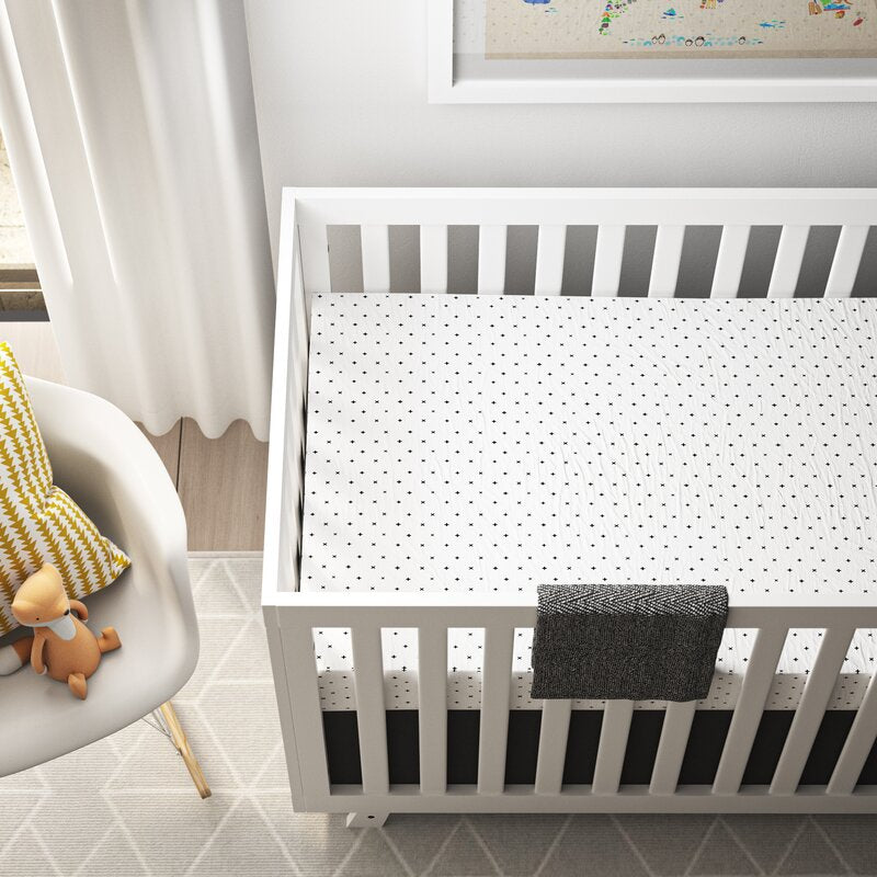 Geometric patterns in modern crib bedding