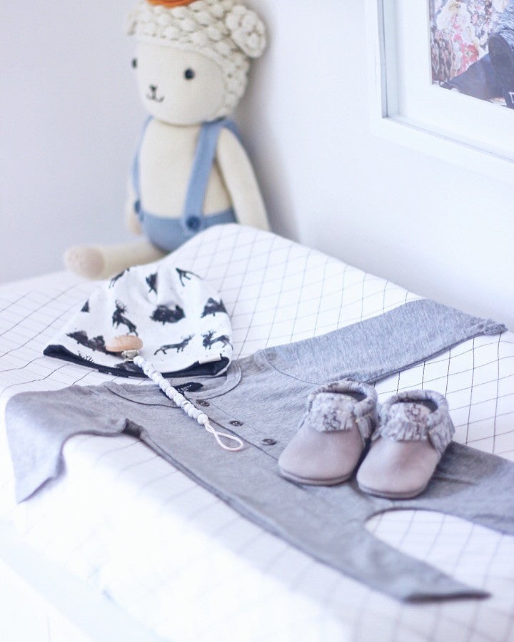 Changing pad covers: practical, stylish, and essential for every nursery