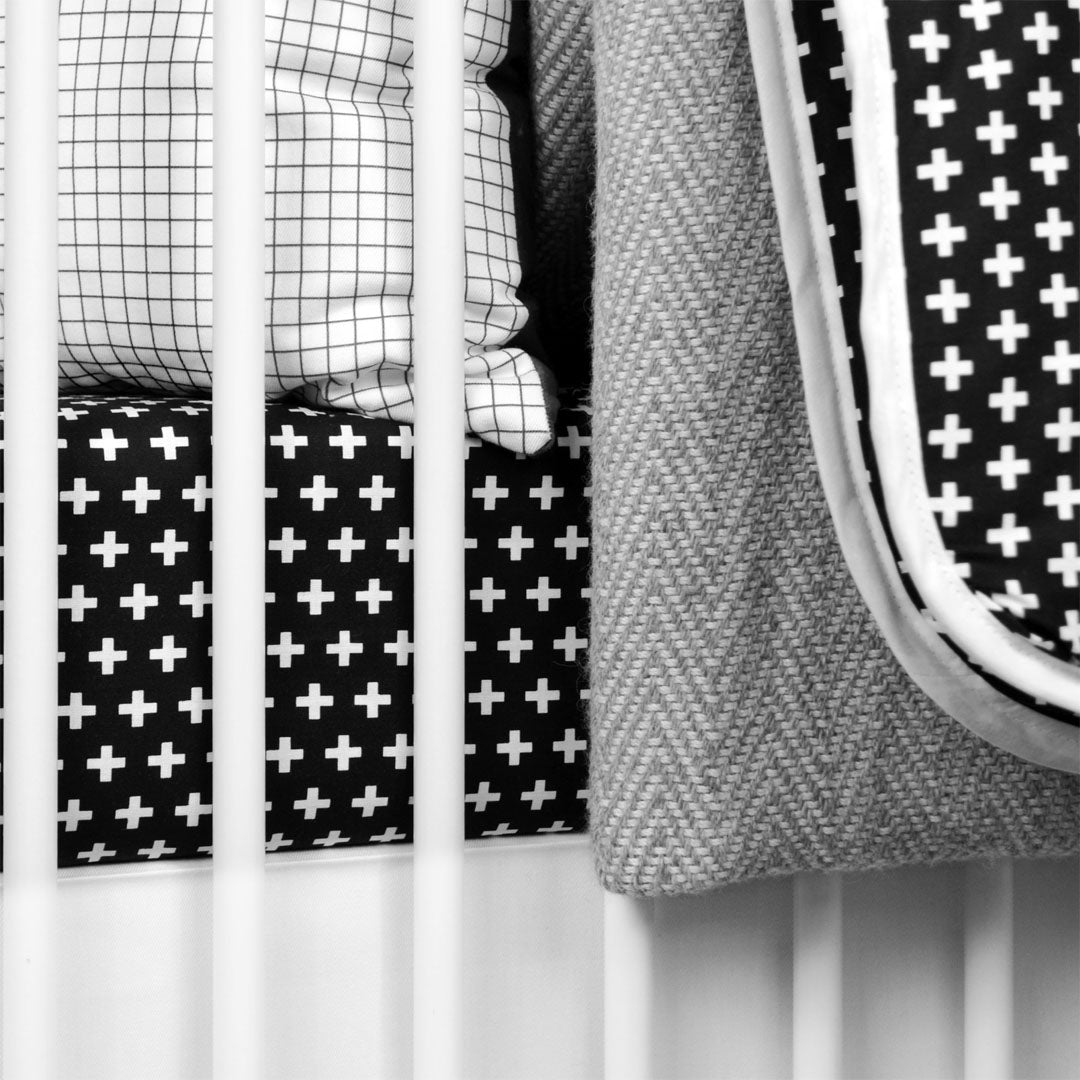 Why is black-and-white beneficial for the development of babies?